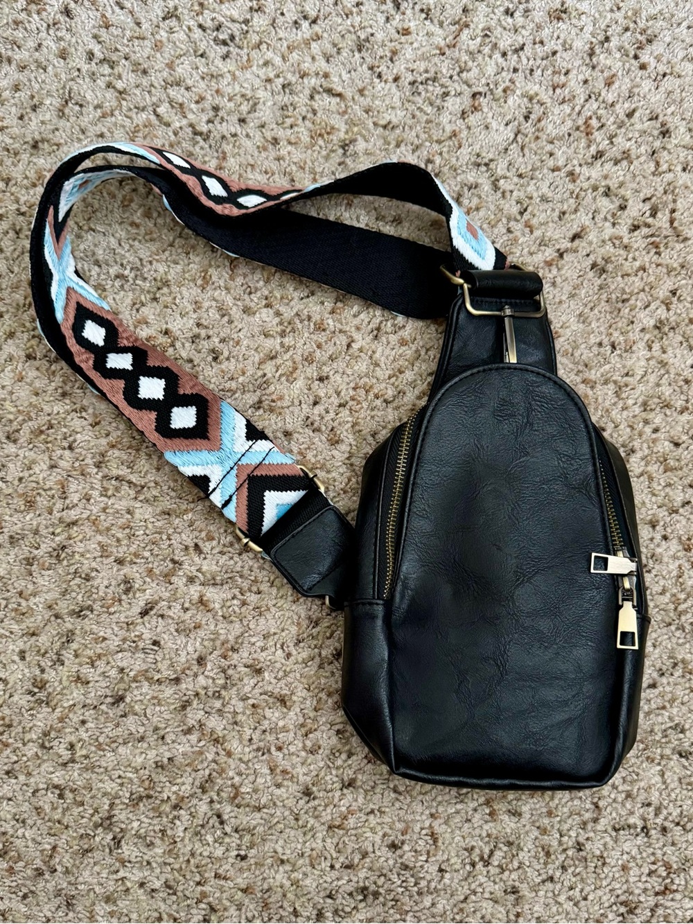Black Crossbody Sling Bag with Patterned Strap
